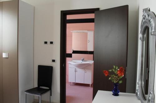 Μια τηλεόραση ή/και κέντρο ψυχαγωγίας στο Casa Vacanza Alba 8-10 posti letto