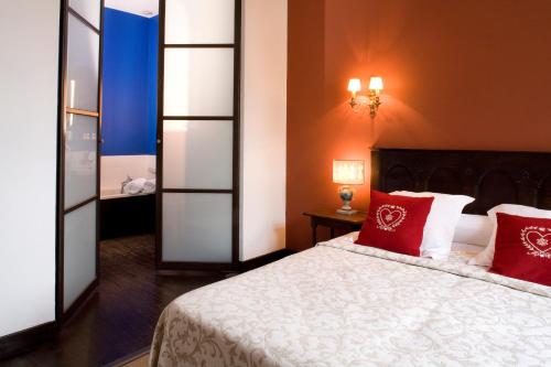 Ένα ή περισσότερα κρεβάτια σε δωμάτιο στο Grand Hôtel de l'Abbaye