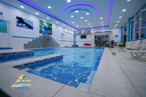 Bazén v ubytování Hotel Marques Amazonico nebo v jeho okolí