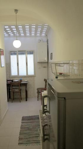 Kuchyň nebo kuchyňský kout v ubytování B&B Del Teatro