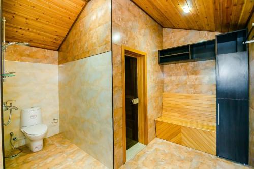 a bathroom with a shower and a toilet in it at BAKU CITY CENTER 4. Bedrooms 4. in Baku