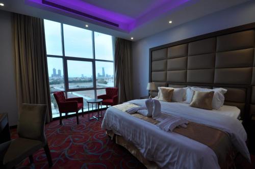 Ένα ή περισσότερα κρεβάτια σε δωμάτιο στο Rozaio Hotel