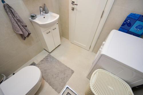 Koupelna v ubytování Seafront apartment Vujovic