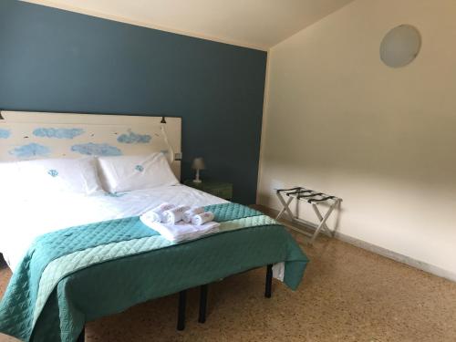 Postel nebo postele na pokoji v ubytování B&B La Casa di Alice
