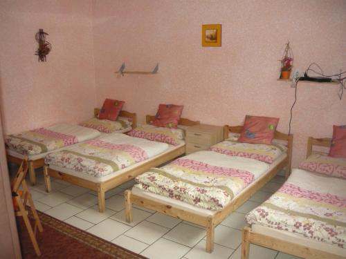 Postel nebo postele na pokoji v ubytování Penzion Hamrovka
