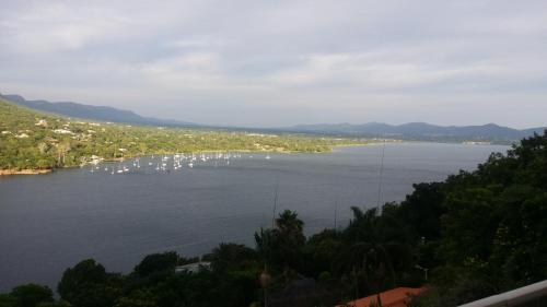 a view of a large lake with boats in it at Letamong in Hartbeespoort