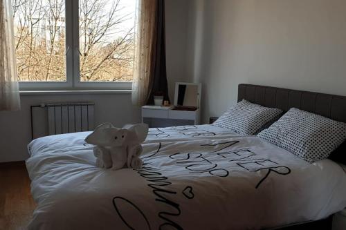 Posteľ alebo postele v izbe v ubytovaní Apartment Marlena