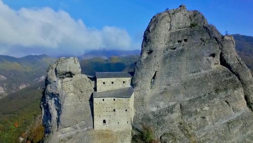 a castle on the side of a mountain at The italian riviera in San Salvatore