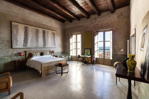 Кровать или кровати в номере Starhost - Trotula Charming Houses