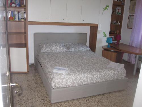 Katil atau katil-katil dalam bilik di Residence Luisa