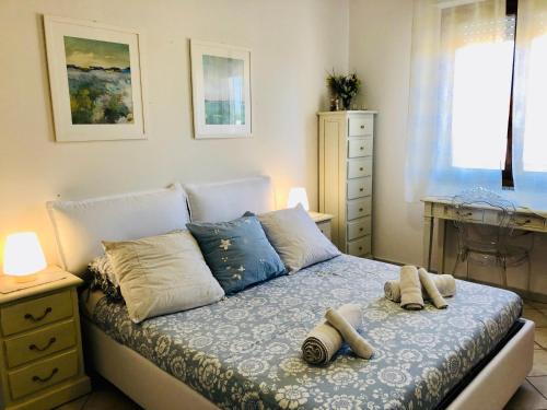 Кровать или кровати в номере Appartamento Francesca