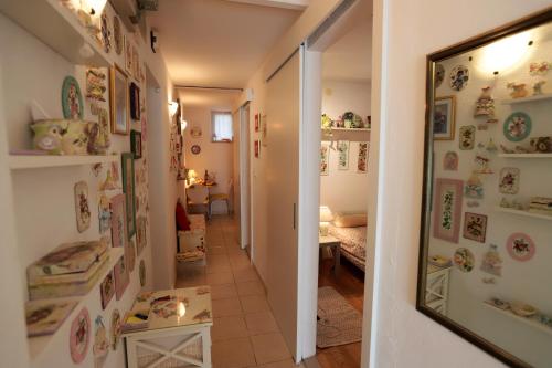 a hallway leading to a room with a bedroom at Apartment Nena in Split