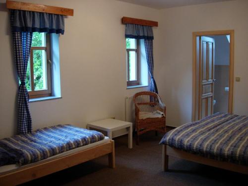 Postel nebo postele na pokoji v ubytování Ekofarma Rytířova Lhota