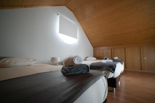 Кровать или кровати в номере Estrela da Serra - Alojamento Local