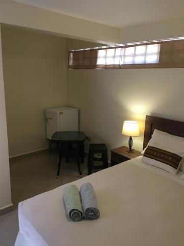 Ένα ή περισσότερα κρεβάτια σε δωμάτιο στο Hostal Anpaymi Atacama