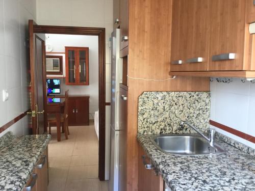 Η κουζίνα ή μικρή κουζίνα στο Apartamento Asturias