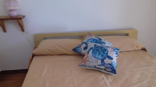 Cama o camas de una habitación en Appartamento Pitagora