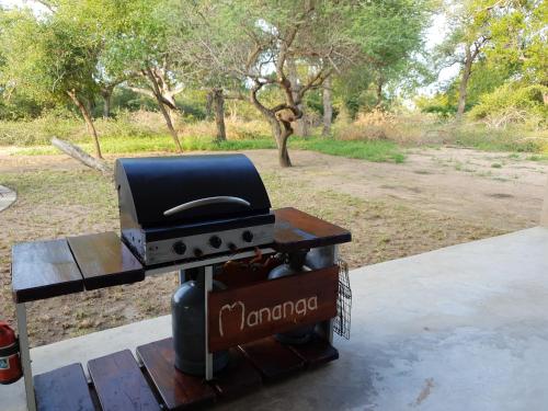 a grill with a toaster on top of it at Mananga Bush Villa in Skukuza