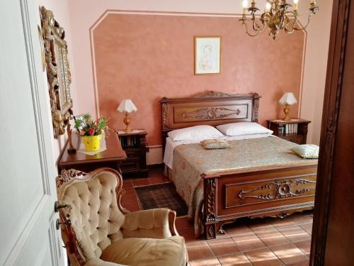 A bed or beds in a room at B&B Villa Carmen
