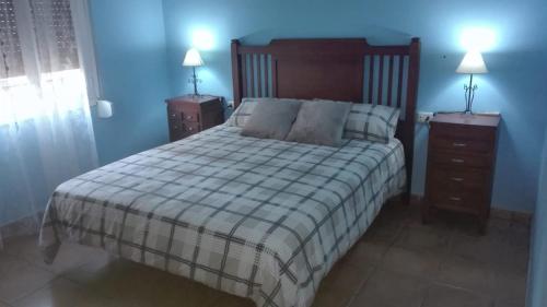 מיטה או מיטות בחדר ב-Casa Serra de Irta