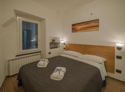 Postel nebo postele na pokoji v ubytování Tedea Apartment