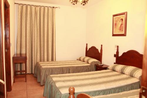 Ένα ή περισσότερα κρεβάτια σε δωμάτιο στο Venta El Laminador