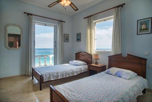 Кровать или кровати в номере CASA DEL MAR