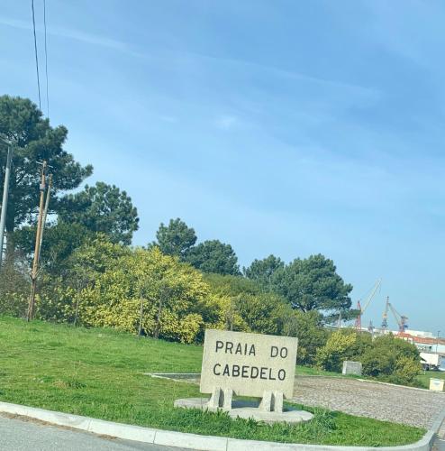 a sign that says pizza do cazaaza at Viana do Castelo, Cabedelo Beach Apartment in Viana do Castelo