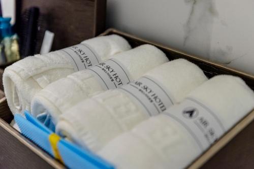 a group of rolls of toilet paper in a drawer at Air Sky Hotel in Busan