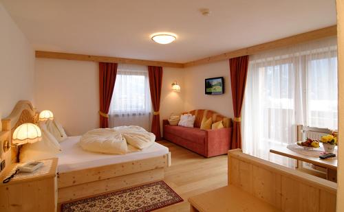 Postel nebo postele na pokoji v ubytování Hotel Talblick