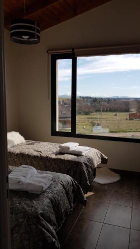 Ένα ή περισσότερα κρεβάτια σε δωμάτιο στο Altas Tierras de Ventania