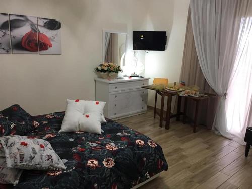 Postel nebo postele na pokoji v ubytování B & B Evergreen