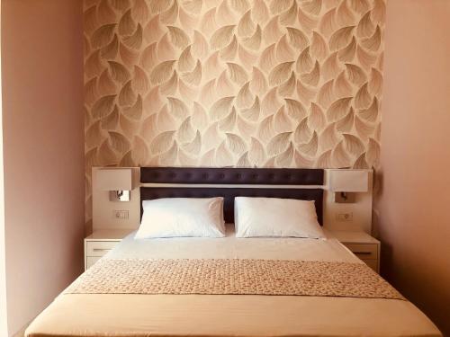 Ένα ή περισσότερα κρεβάτια σε δωμάτιο στο Lovely Apartments D
