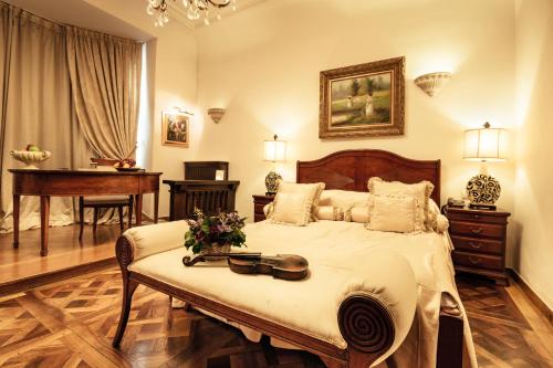 Postel nebo postele na pokoji v ubytování Scala Boutique-Hotel