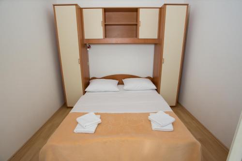 Postel nebo postele na pokoji v ubytování Beach Studio Apartment Marija