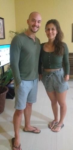 a man and a woman standing next to each other at Soul Travellers Dagatan Guesthouse in Badian