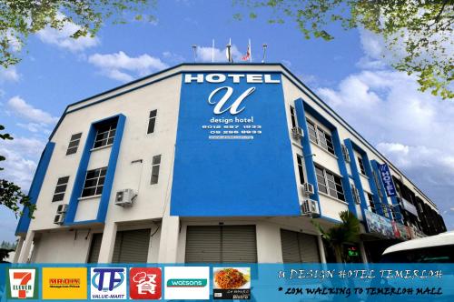 Un certificado, premio, letrero u otro documento en U Design Hotel Temerloh
