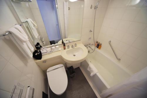 Ένα μπάνιο στο Hotel Sunroute Stellar Ueno