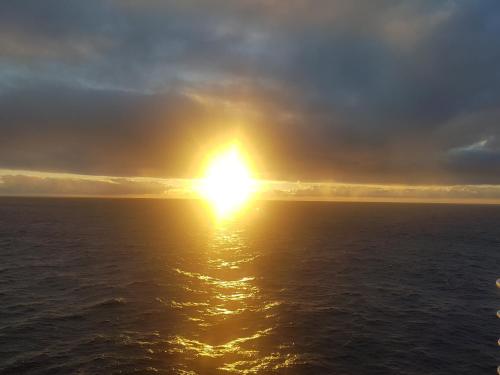 an image of the sun setting over the ocean at Rickaty Lodge Bed and Breakfast, Airport Hotel, Hotel de aeropuerto, Las Palmas Airport, Gran Canaria Airport, LPA, Spain in Las Puntillas