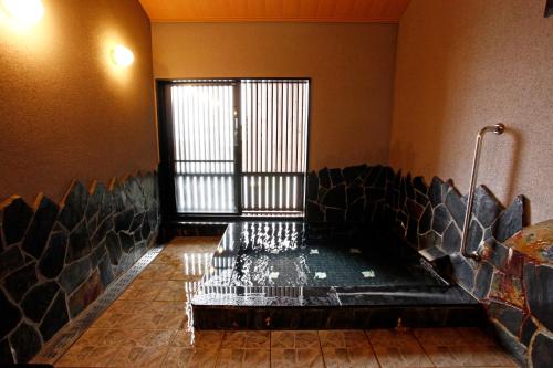 Χώρος καθιστικού στο Hotel Shosenkaku Romankan