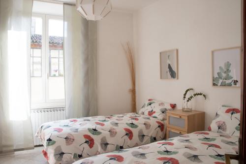 Postel nebo postele na pokoji v ubytování Alloggio Turistico al Civico n 32