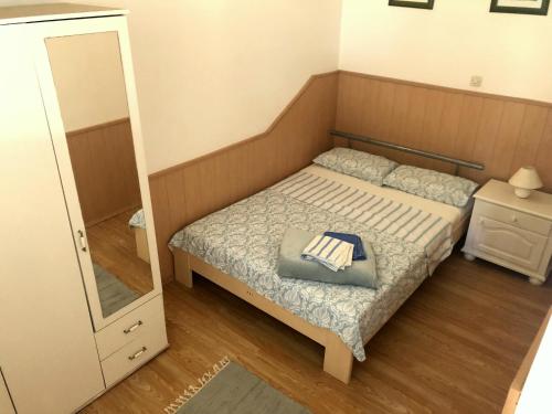 Postel nebo postele na pokoji v ubytování Guesthouse Vila Ruzmarin