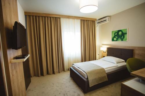 Katil atau katil-katil dalam bilik di Hotel Zelenkrov