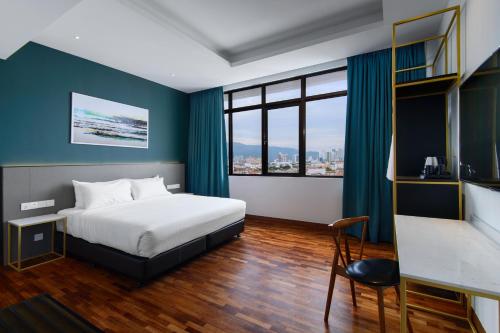 Una cama o camas en una habitación de SAVV HOTEL