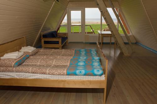 Cama o camas de una habitación en Kosmonautika Puhkekeskus