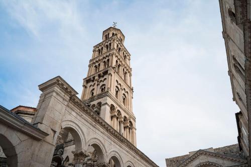 a tall clock tower on top of a building at Heritage Hotel Antique Split in Split