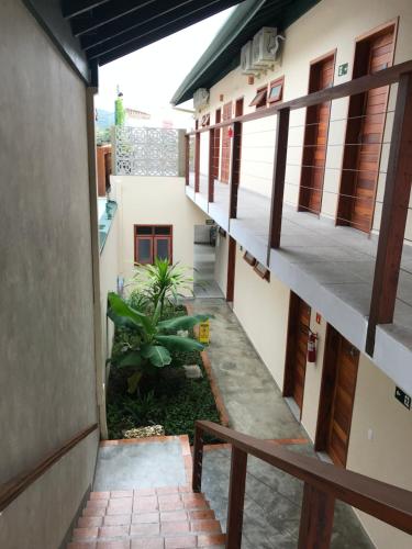 a view from the balcony of a building at Nai'a Suites in Ubatuba