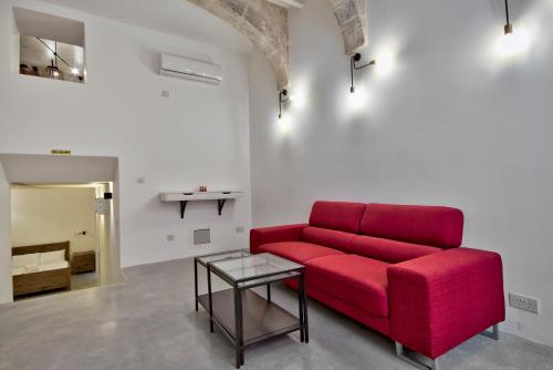 Area tempat duduk di Vallettastay Casa Zoe