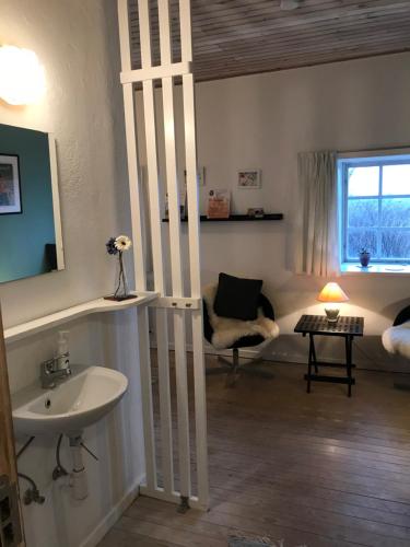 Ванная комната в Præstøgaard