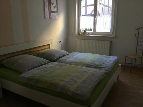 Giường trong phòng chung tại Ferienwohnung Misch